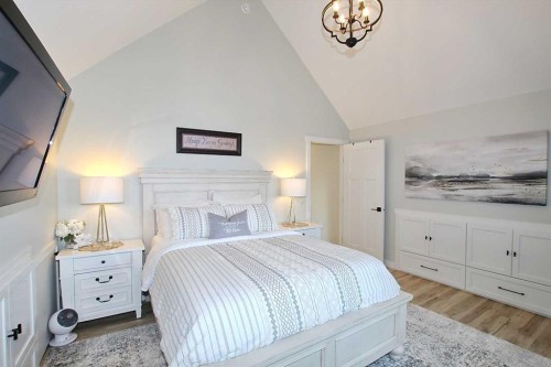 108 Marina Bay Court, Sylvan Lake, AB - Indoor Photo Showing Bedroom