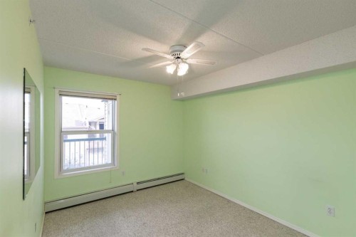 205-4319 49 Street, Innisfail, AB - Indoor Photo Showing Other Room