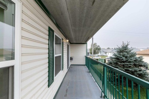 205-4319 49 Street, Innisfail, AB - Outdoor With Balcony With Exterior