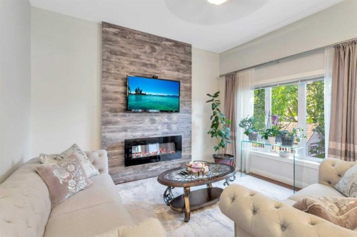 149 Carrington Drive, Red Deer, AB - Indoor Photo Showing Living Room With Fireplace