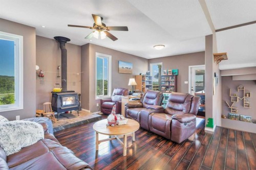 394073 Range Road 44, Rural Clearwater County, AB - Indoor Photo Showing Living Room With Fireplace