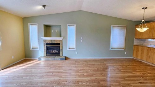 621 6 Avenue Sw, Sundre, AB - Indoor Photo Showing Living Room With Fireplace