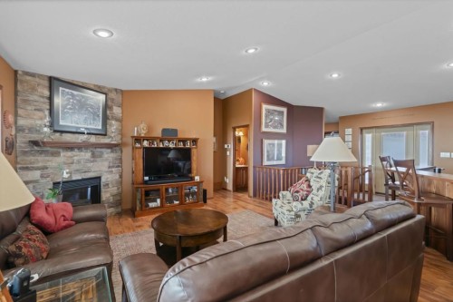 229-41251 Range Road 210, Rural Camrose County, AB - Indoor Photo Showing Living Room With Fireplace