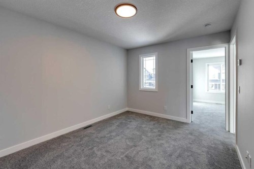 180 Sora Terrace Se, Calgary, AB - Indoor Photo Showing Other Room