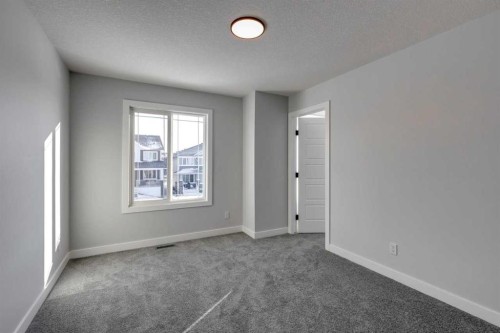 180 Sora Terrace Se, Calgary, AB - Indoor Photo Showing Other Room