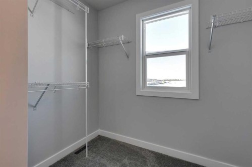 180 Sora Terrace Se, Calgary, AB - Indoor With Storage