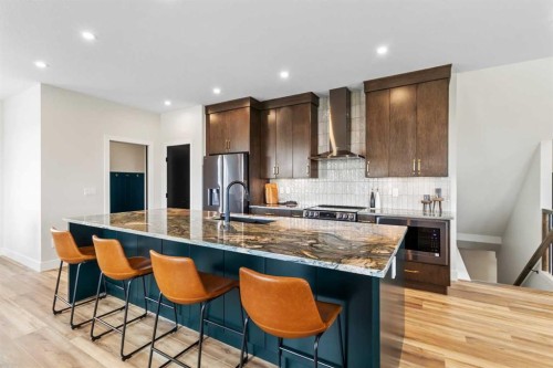 22 Aura Drive, Blackfalds, AB - Indoor Photo Showing Kitchen With Upgraded Kitchen