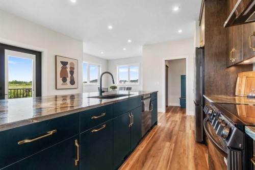 22 Aura Drive, Blackfalds, AB - Indoor Photo Showing Kitchen With Upgraded Kitchen