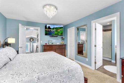 5 Heritage Drive, Penhold, AB - Indoor Photo Showing Bedroom