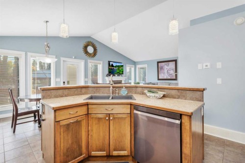 5 Heritage Drive, Penhold, AB - Indoor Photo Showing Kitchen With Double Sink