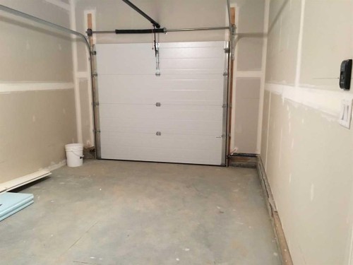 61 Maclean Close, Blackfalds, AB - Indoor Photo Showing Garage