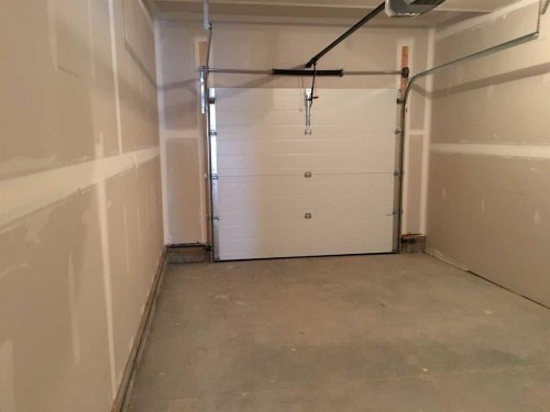 61 Maclean Close, Blackfalds, AB - Indoor Photo Showing Garage