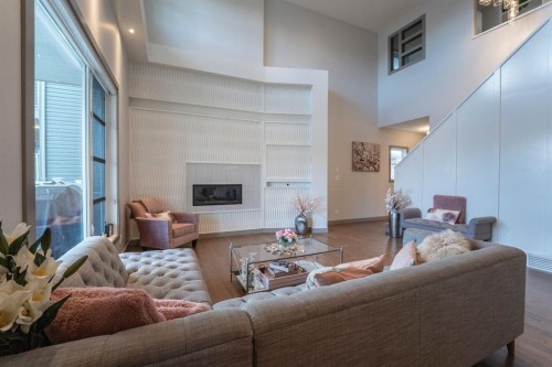 17 Lazaro Close, Red Deer, AB - Indoor Photo Showing Living Room With Fireplace