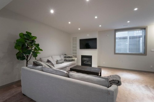 17 Lazaro Close, Red Deer, AB - Indoor Photo Showing Living Room With Fireplace