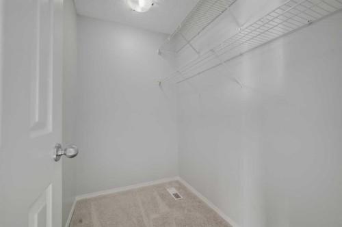 45 Cranberry Square, Calgary, AB - Indoor With Storage