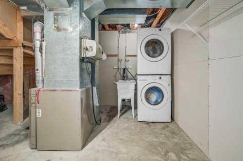 45 Cranberry Square, Calgary, AB - Indoor Photo Showing Laundry Room