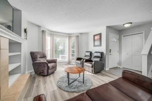 45 Cranberry Square, Calgary, AB - Indoor Photo Showing Living Room
