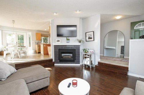 238 Davison Drive, Red Deer, AB - Indoor Photo Showing Living Room With Fireplace