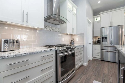 68 Thompson Crescent, Red Deer, AB - Indoor Photo Showing Kitchen With Stainless Steel Kitchen With Upgraded Kitchen