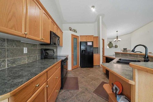 61 Leung Close, Red Deer, AB - Indoor Photo Showing Kitchen With Double Sink