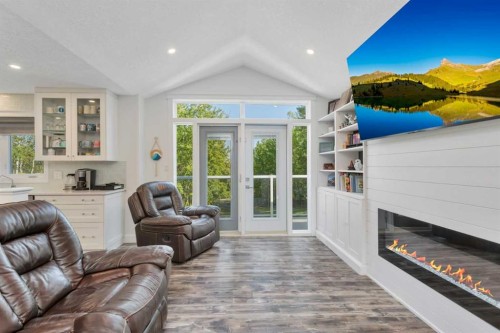 91-39200 Range Road 282, Rural Red Deer County, AB - Indoor Photo Showing Living Room With Fireplace