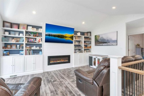 91-39200 Range Road 282, Rural Red Deer County, AB - Indoor Photo Showing Living Room With Fireplace