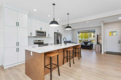 7 Evergreen Way, Red Deer, AB - Indoor Photo Showing Kitchen With Stainless Steel Kitchen With Upgraded Kitchen