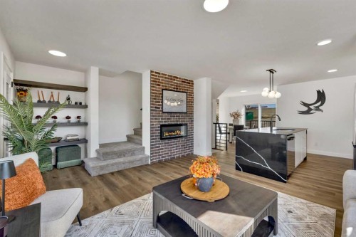 26 Violet Point, Sylvan Lake, AB - Indoor Photo Showing Living Room With Fireplace