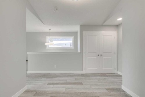 121 Silverton Glen Way Sw, Calgary, AB - Indoor Photo Showing Other Room