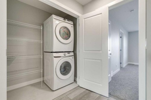 121 Silverton Glen Way Sw, Calgary, AB - Indoor Photo Showing Laundry Room