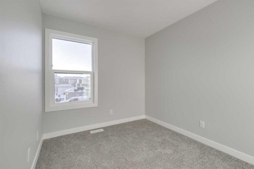 121 Silverton Glen Way Sw, Calgary, AB - Indoor Photo Showing Other Room