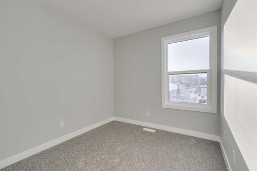 121 Silverton Glen Way Sw, Calgary, AB - Indoor Photo Showing Other Room