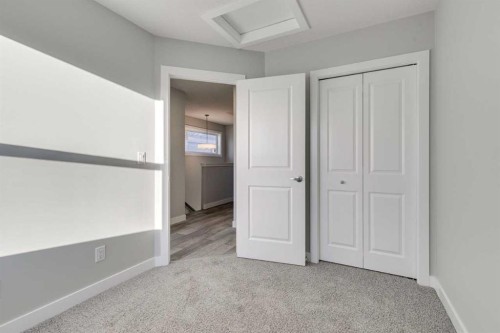 121 Silverton Glen Way Sw, Calgary, AB - Indoor Photo Showing Other Room