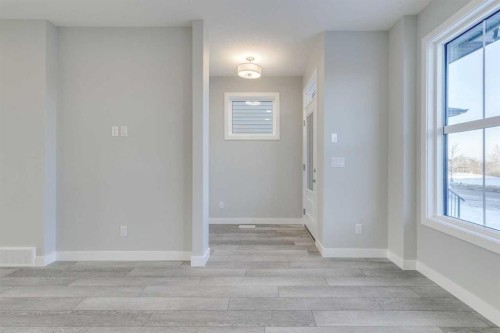121 Silverton Glen Way Sw, Calgary, AB - Indoor Photo Showing Other Room