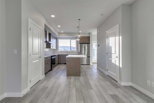 121 Silverton Glen Way Sw, Calgary, AB - Indoor Photo Showing Kitchen With Upgraded Kitchen