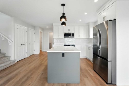 54 Vista Close, Blackfalds, AB - Indoor Photo Showing Kitchen With Upgraded Kitchen