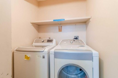 59 Nyman Crescent, Red Deer, AB - Indoor Photo Showing Laundry Room