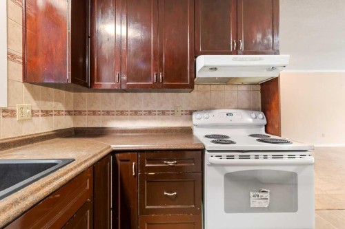 59 Nyman Crescent, Red Deer, AB - Indoor Photo Showing Kitchen