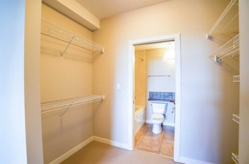 321-100 Lakeway Boulevard, Sylvan Lake, AB - Indoor With Storage