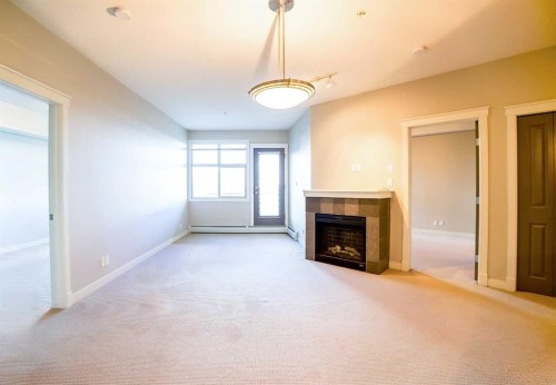 321-100 Lakeway Boulevard, Sylvan Lake, AB - Indoor With Fireplace