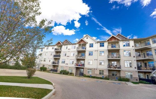321-100 Lakeway Boulevard, Sylvan Lake, AB - Outdoor With Facade