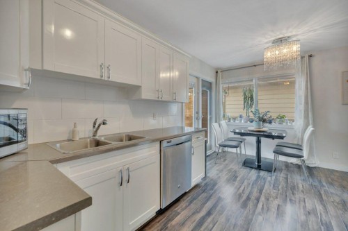 7715 73 Avenue Nw, Edmonton, AB - Indoor Photo Showing Kitchen With Stainless Steel Kitchen With Double Sink