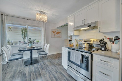 7715 73 Avenue Nw, Edmonton, AB - Indoor Photo Showing Kitchen With Stainless Steel Kitchen