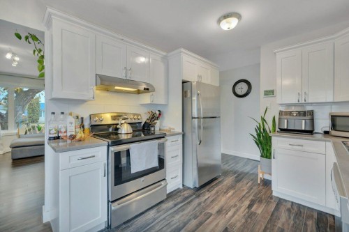 7715 73 Avenue Nw, Edmonton, AB - Indoor Photo Showing Kitchen With Stainless Steel Kitchen With Upgraded Kitchen
