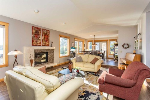 37 Wildrose Street, Rural Lacombe County, AB - Indoor Photo Showing Living Room With Fireplace