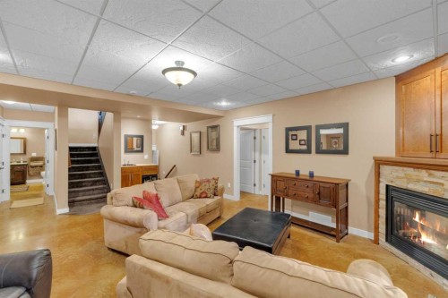 40 Oakfield Close, Red Deer, AB - Indoor Photo Showing Living Room With Fireplace