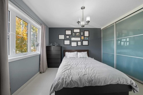709 Cypress Lane, Springbrook, AB - Indoor Photo Showing Bedroom