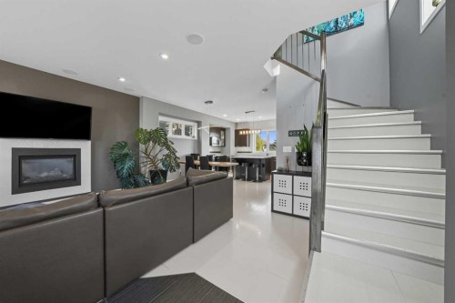 709 Cypress Lane, Springbrook, AB - Indoor Photo Showing Other Room With Fireplace
