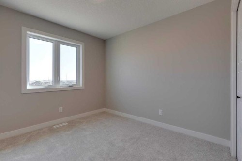 53 Southborough Lane, Cochrane, AB - Indoor Photo Showing Other Room
