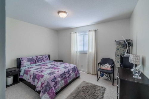 65 Fern Glade Crescent, Sylvan Lake, AB - Indoor Photo Showing Bedroom